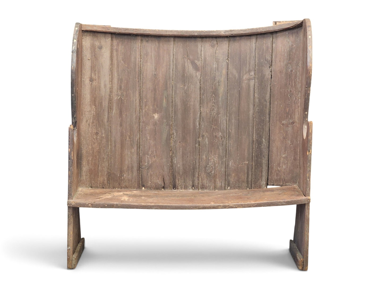 18TH-CENTURY SETTLE BENCH: Probably American, pine. Small size, with a slightly bowed shape, scroll-cut ends, and rosehead nails. 50.5" high, 51" wide, 13" deep. Provenance: a New York State collection NOTE: We are happy to