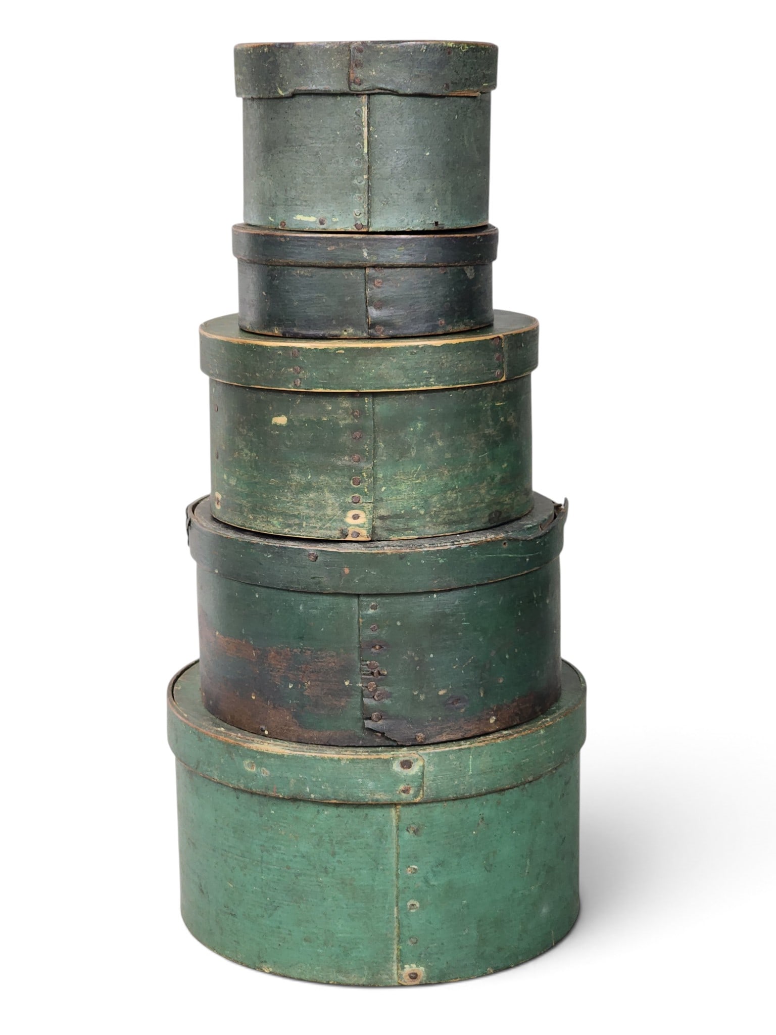 ASSEMBLED STACK OF GREEN-PAINTED PANTRY BOXES: American, 19th century, bentwood. Five boxes, graduated from 10" to 5.75", all in early or original green paint. Provenance: a New York State collection NOTE: We are happy to answer questions and