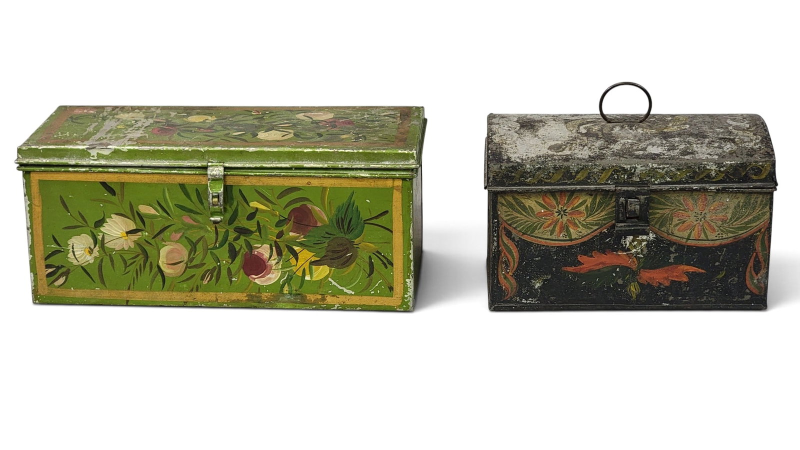 TWO AMERICAN TOLEWARE BOXES: Early-mid-19th century. A green box with floral decoration and signed inside "Parmer Watson," 5" high, 12.5" wide, 5.5" deep; together with a black box with floral and swag decoration, 5.5" High, 9"