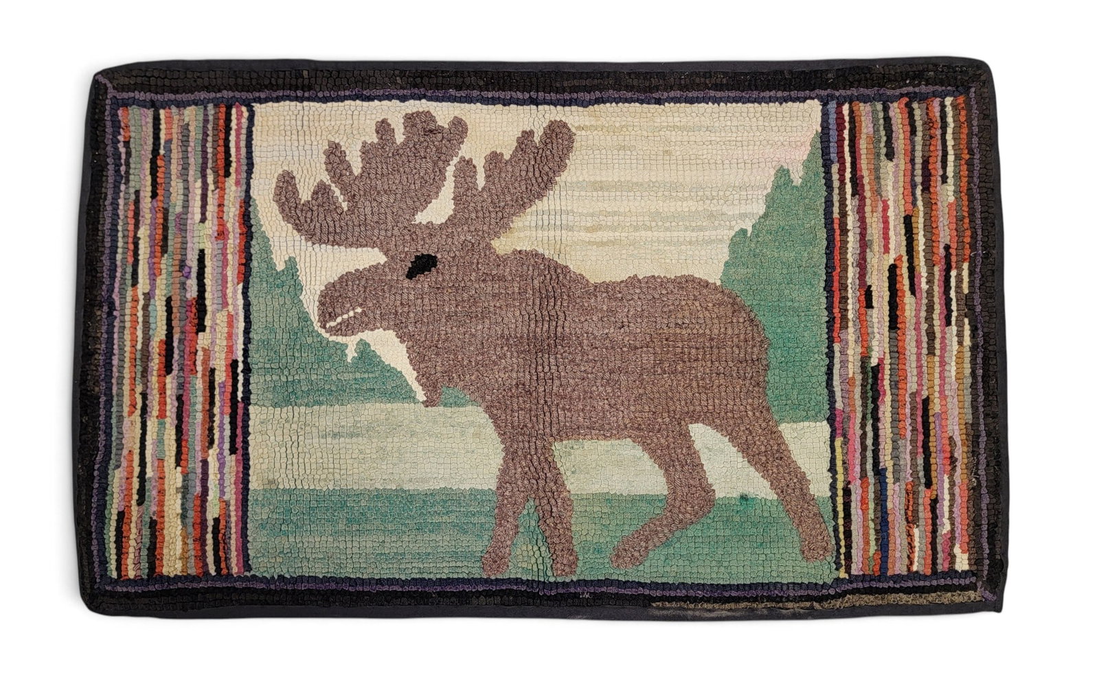 NEW ENGLAND HOOKED RUG WITH MOOSE: 1st half-20th century. Standing moose flanked by colorful stripes. 40" by 24". Provenance: a New York State collection NOTE: We are happy to answer questions and take additional photos of lots prior
