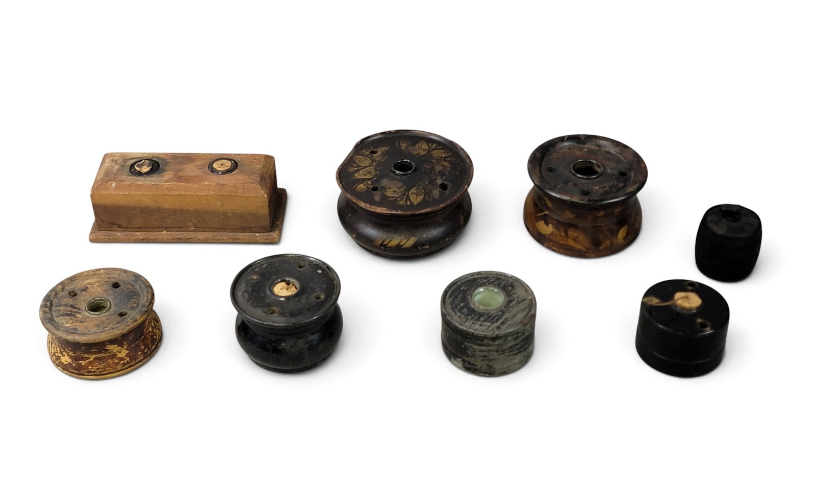COLLECTION OF EARLY ITEMS INCL. LIGHTING AND TREEN: 19th century. Includes a crib ball, treen bowl (4.5" diameter), three miniature lamps, a folding straight razor, and three snuff boxes (including shell and a George III painted tin box). Provenance: