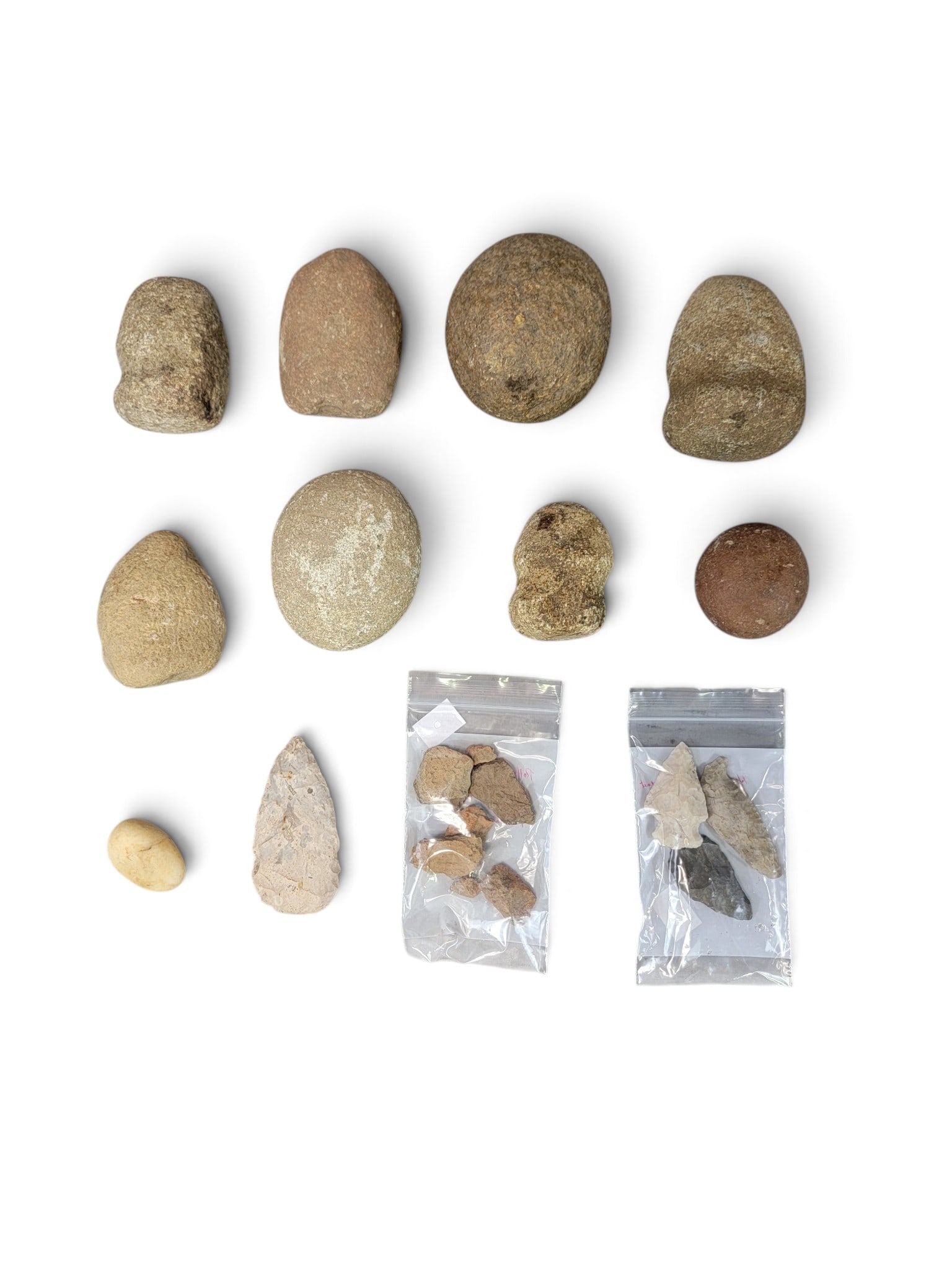 COLLECTION OF OHIO NATIVE AMERICAN ARTIFACTS: All collected 1980s-2000s in Henry County. Includes points, pottery fragments, grooved ax, grinding stones, etc. Provenance: the Collection of Bill Williamsen, Grand Rapids, Ohio. NOTE: We are happy