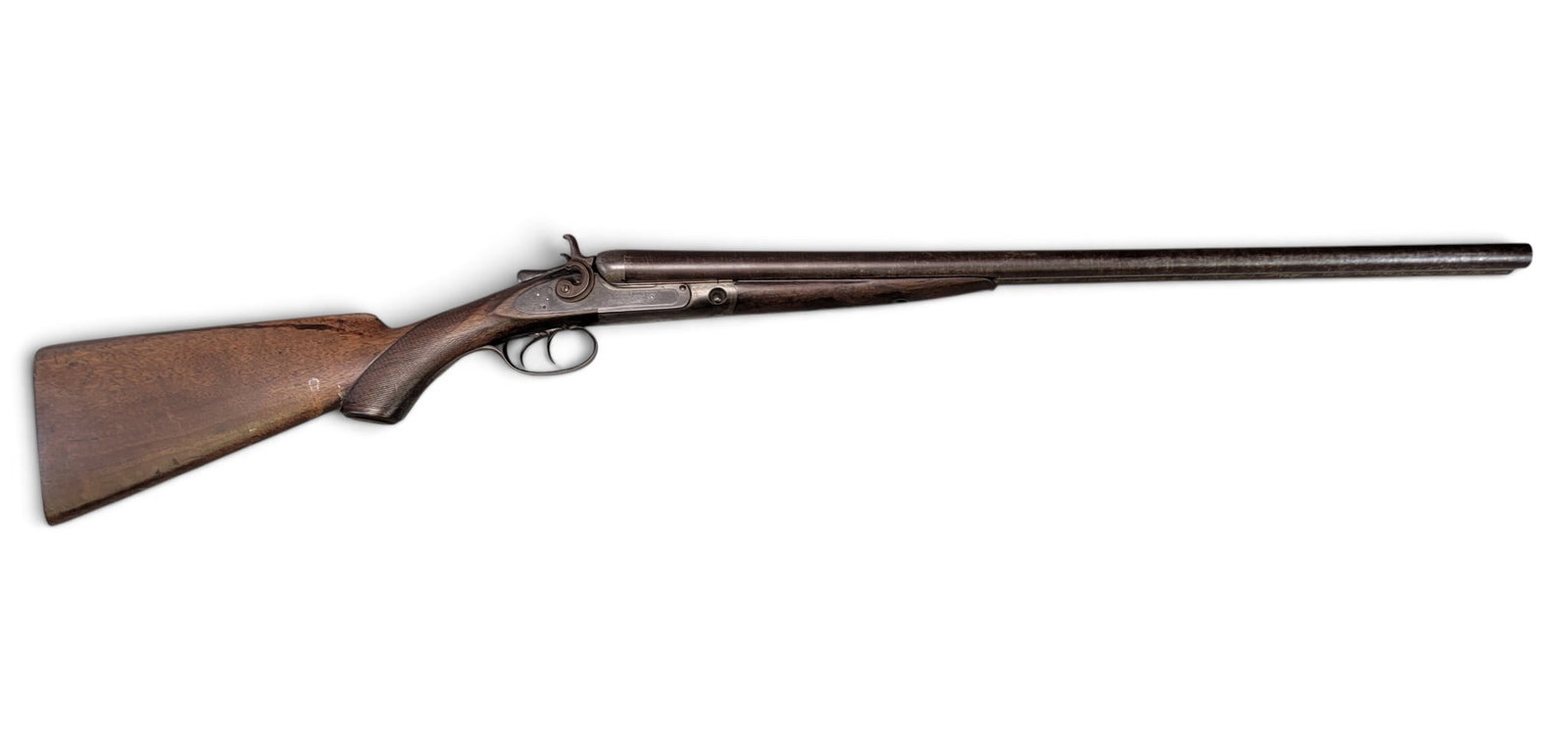 PARKER BROS. DOUBLE-BARREL SHOTGUN: Meriden, CT, 1880s. 12ga, 30" double twist barrels, walnut stock with checkered wrist. S/n 31117 on forend, watertable, and tang. Provenance: the collection of Bob and Maxine Edwards, New