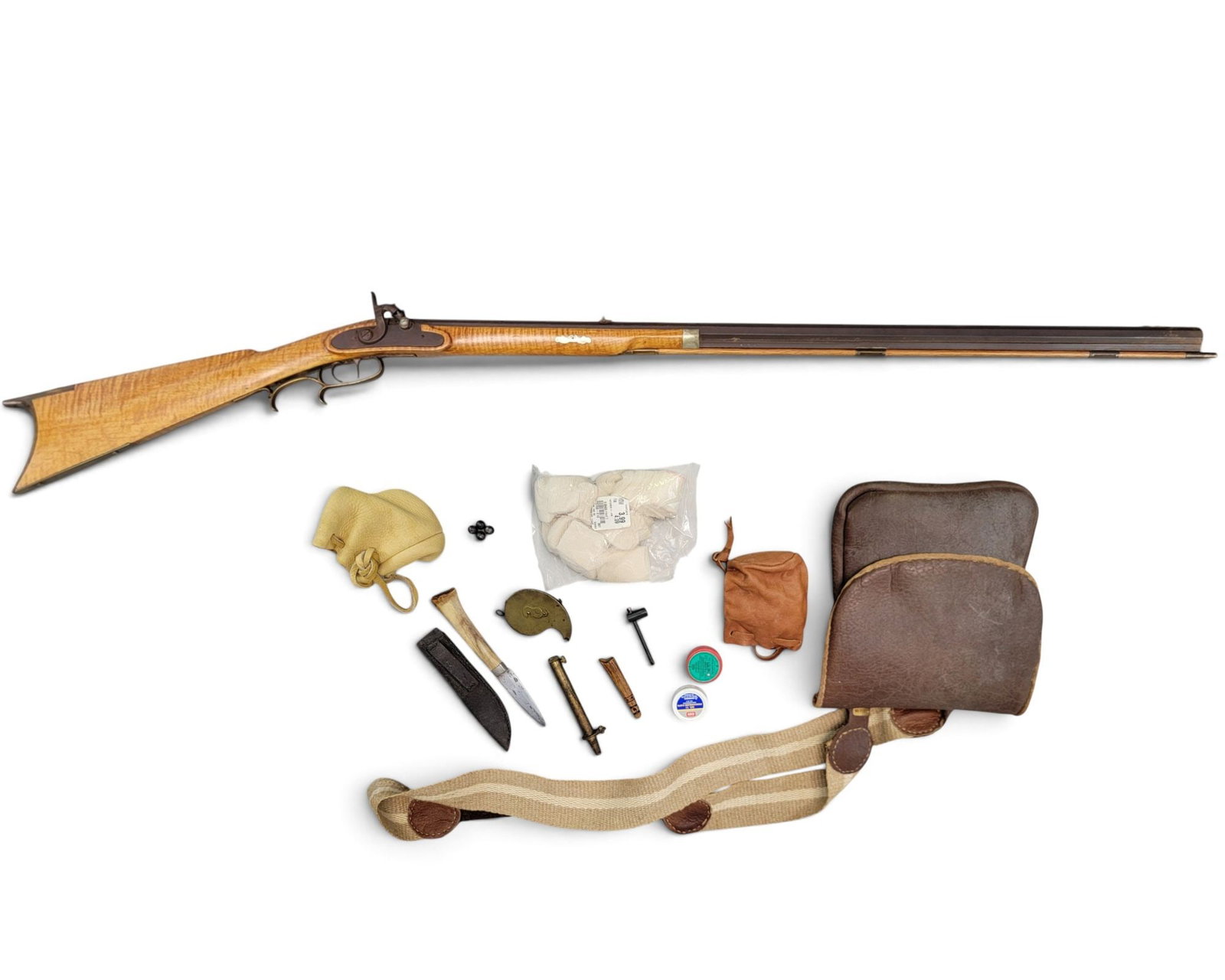 CONTEMPORARY HALF-STOCK RIFLE: Made by Bill Williamsen, Grand Rapids, Ohio, in the manner of the Vincent family. Approx. 40cal, 36" octagonal barrel, curly maple stock with inlays. 51" long. Together with a shot pouch and various