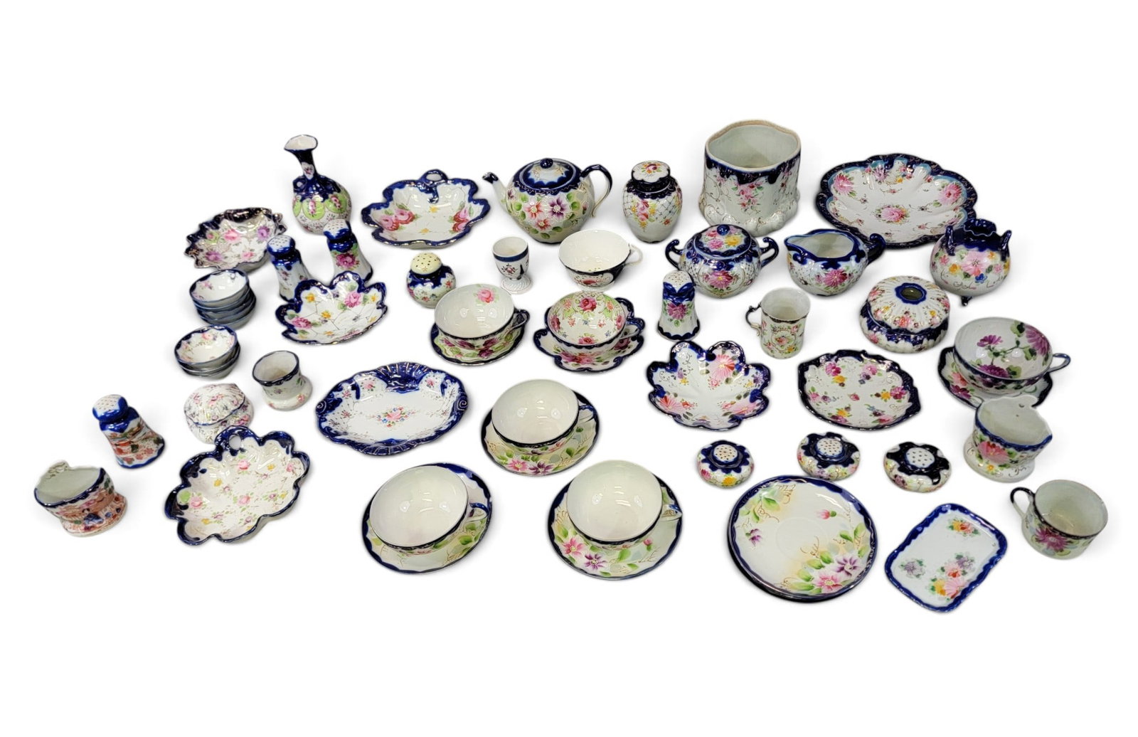 SET OF NIPPON HANDPAINTED CHINA: Japan, 20th century. With a floral pattern. Approx. 56 pieces. Provenance: a western New York collection. NOTE: We are happy to answer questions and take additional photos of lots prior to the