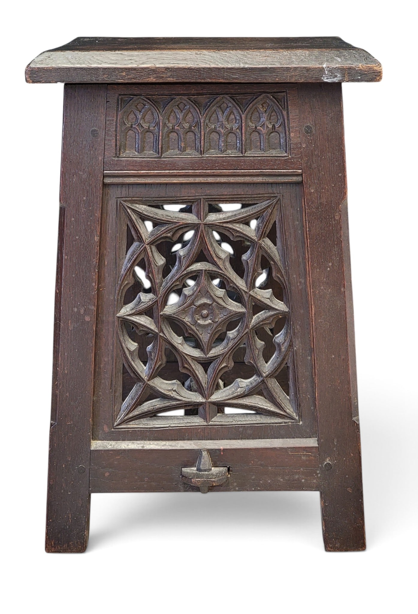 ARTS AND CRAFTS STOOL: American or English, early 20th century, oak. With pierce-carved sides and retaining its original finish. 20.5" high, 13" square. Provenance: an Idaho collection. NOTE: We are happy to answer