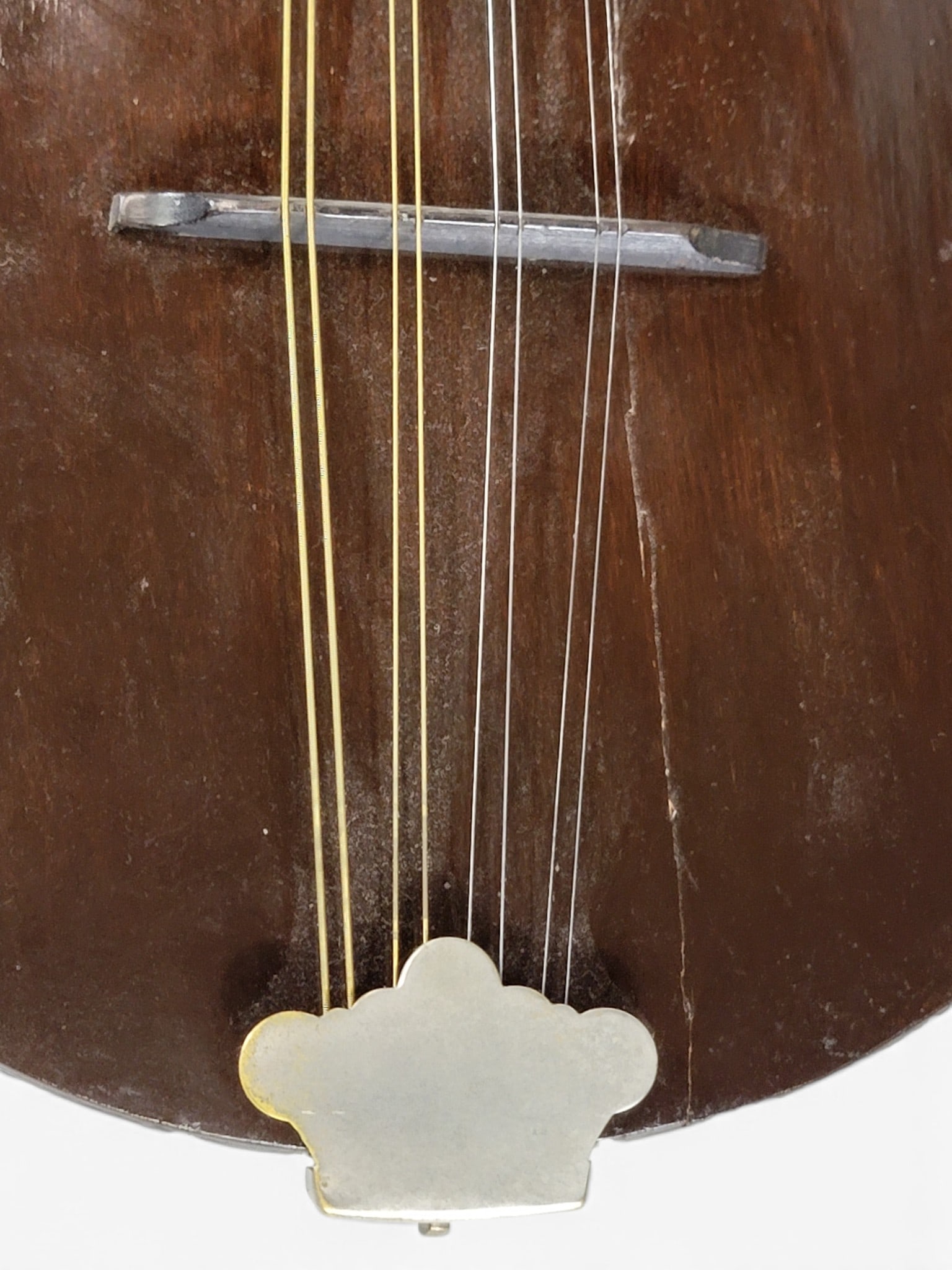 LYON & HEALY MANDOLIN: Not labled, 1st half-20th century. Reverse scroll. 25" long. Provenance: a Michigan collection. NOTE: We are happy to answer questions and take additional photos of lots prior to the auction (the
