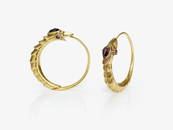 A pair of snake-shaped earrings with garnets