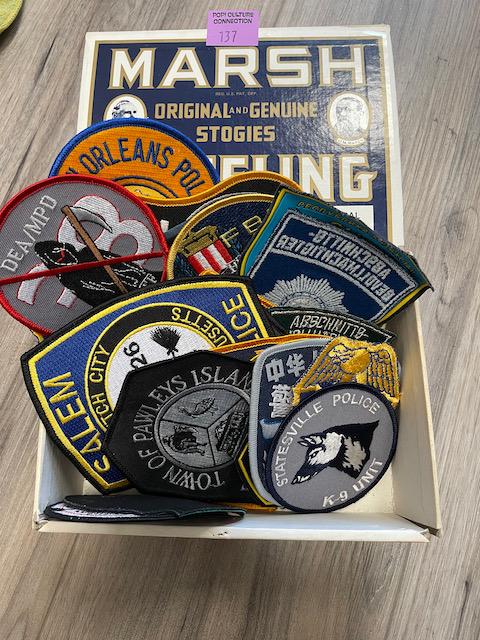 LARGE LOT OF POLICE BADGES AND MORE: Comes as seen in pictures
