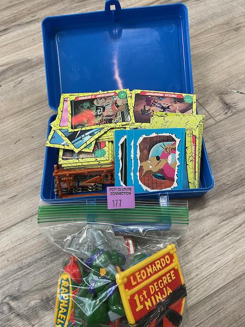 TEENAGE MUTANT NINJA TURTLES CASE, CARDS, AND PREMIUMS: Comes as seen in pictures