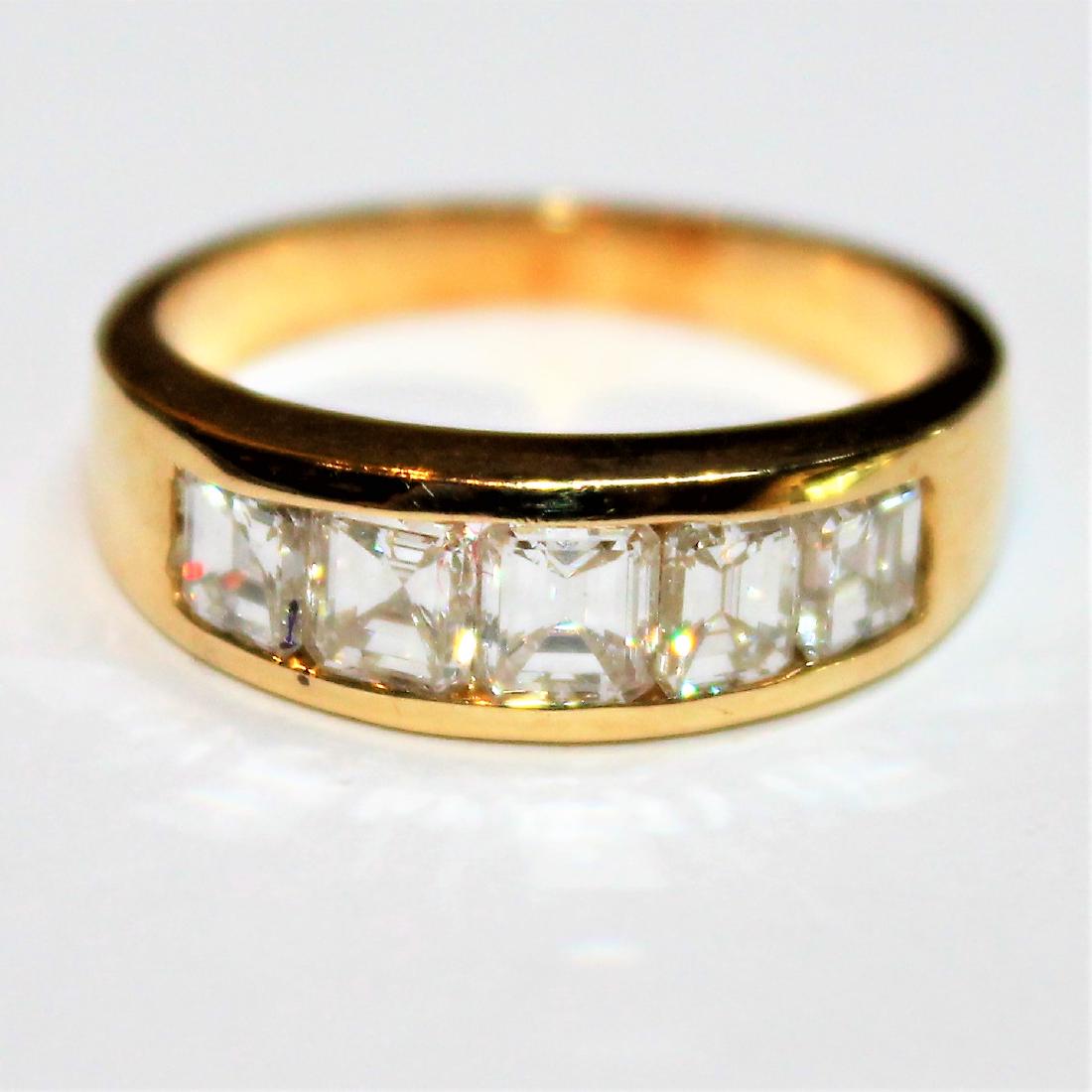 BAGUE JONC  en or jaune, sertie clos en rail (1 of 1)