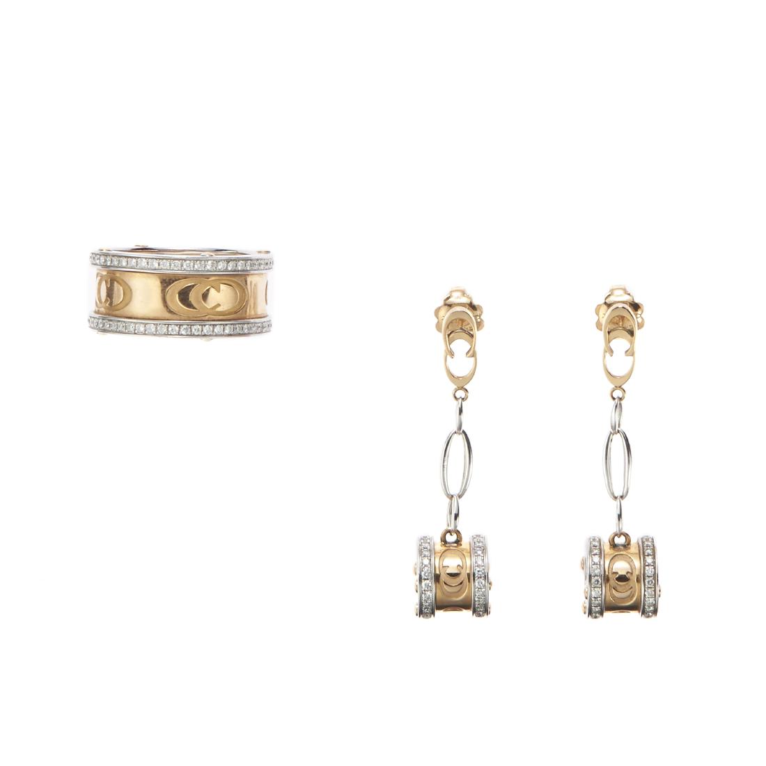 Two colour gold and diamond demi parure, Chimento: Two colour gold and diamond demi parure, Chimento Composed of a band ring e a pair of pendant earrings, embellished with brillaint-cut diamonds Total weight gr 24,8 Ring size 20 Earrings lenght cm 4