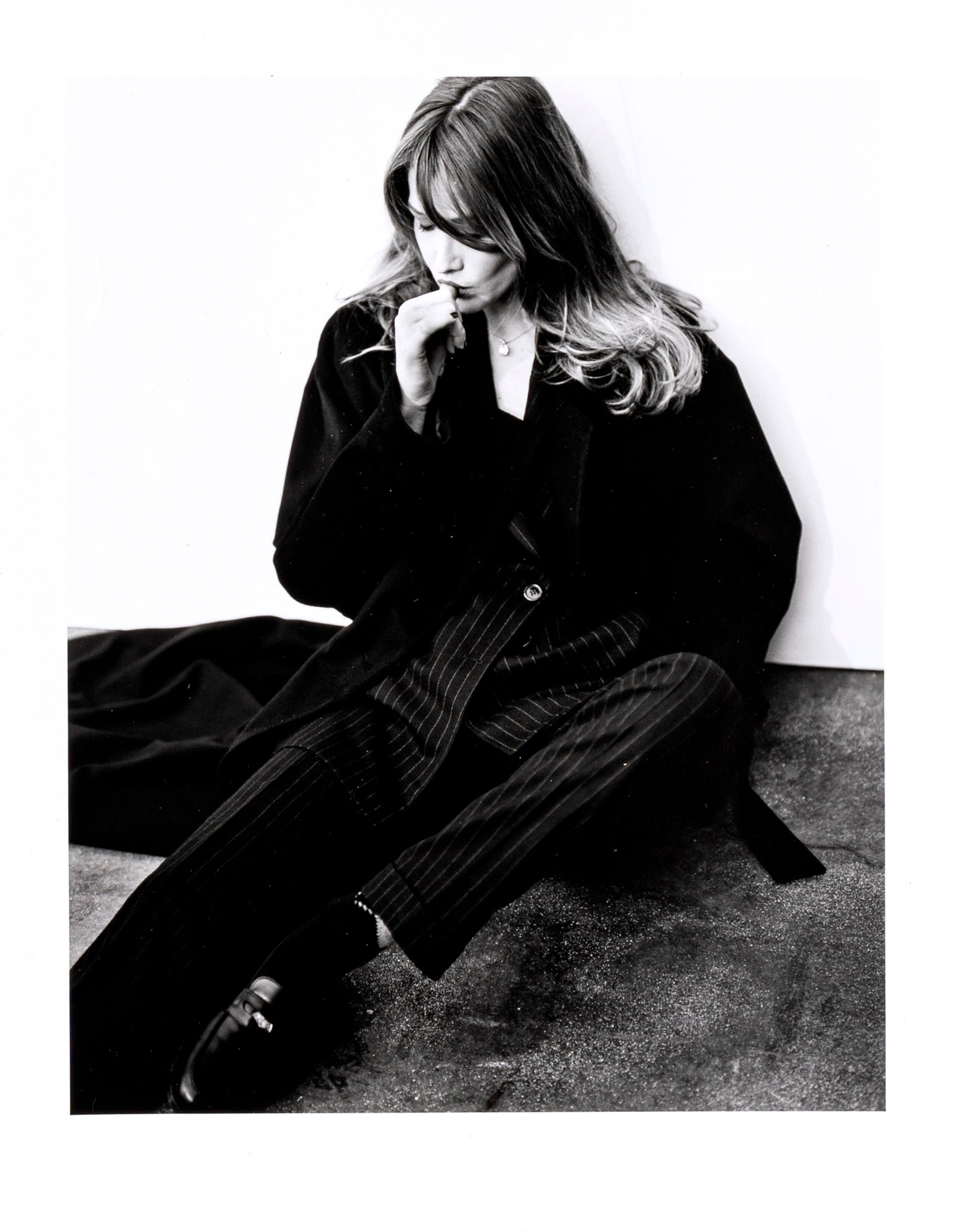 KURT MARKUS, Carla Bruni: KURT MARKUS (1947 - 2022) Carla Bruni 1990 circa Black and white photo 35,5 x 27,6 cm Artist's stamp on the reverse PROVENANCE: Private collection, Milan