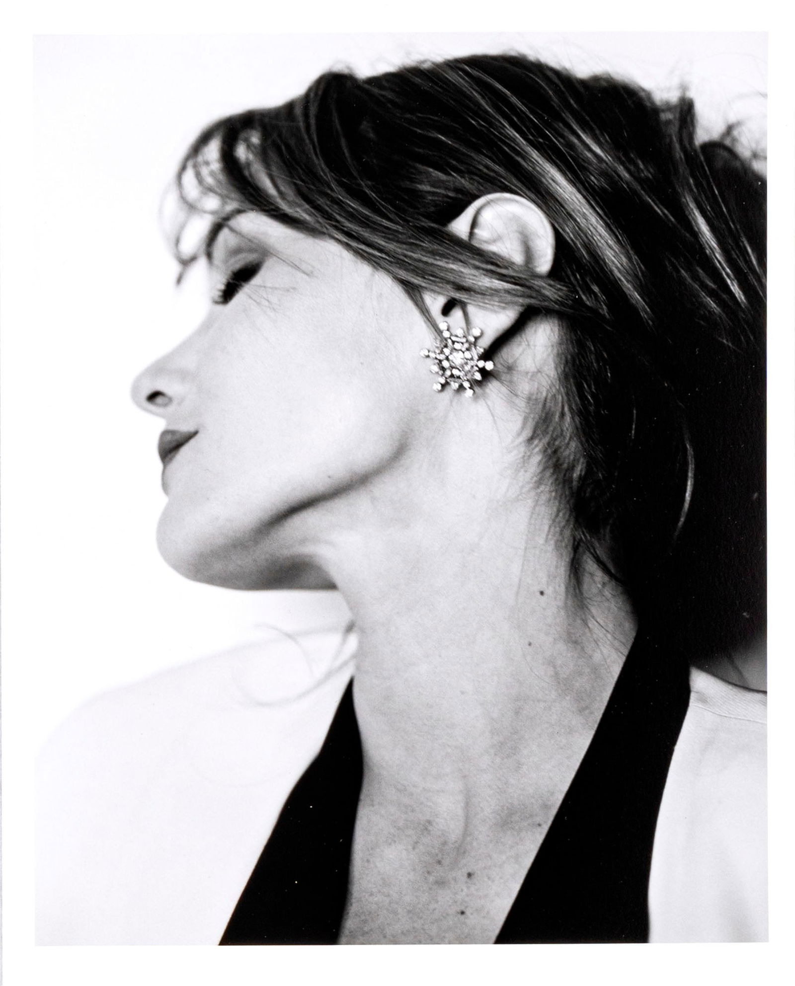 KURT MARKUS, Carla Bruni: KURT MARKUS (1947 - 2022) Carla Bruni 1990 circa Black and white photo 25 x 20,4 cm Artist's stamp on the reverse PROVENANCE: Private collection, Milan