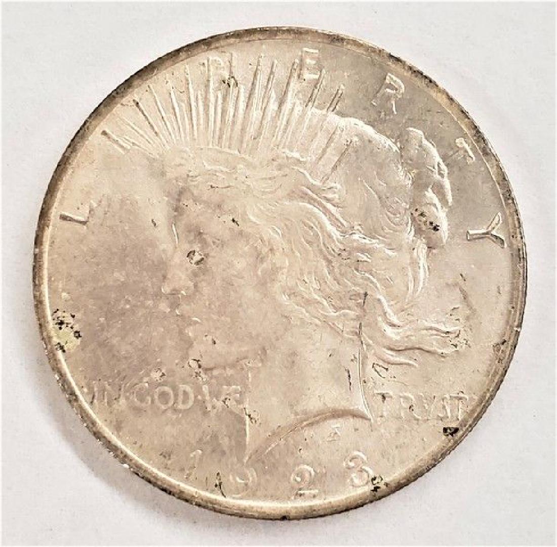 1923-P SILVER PEACE DOLLAR MS63 (1 of 2)