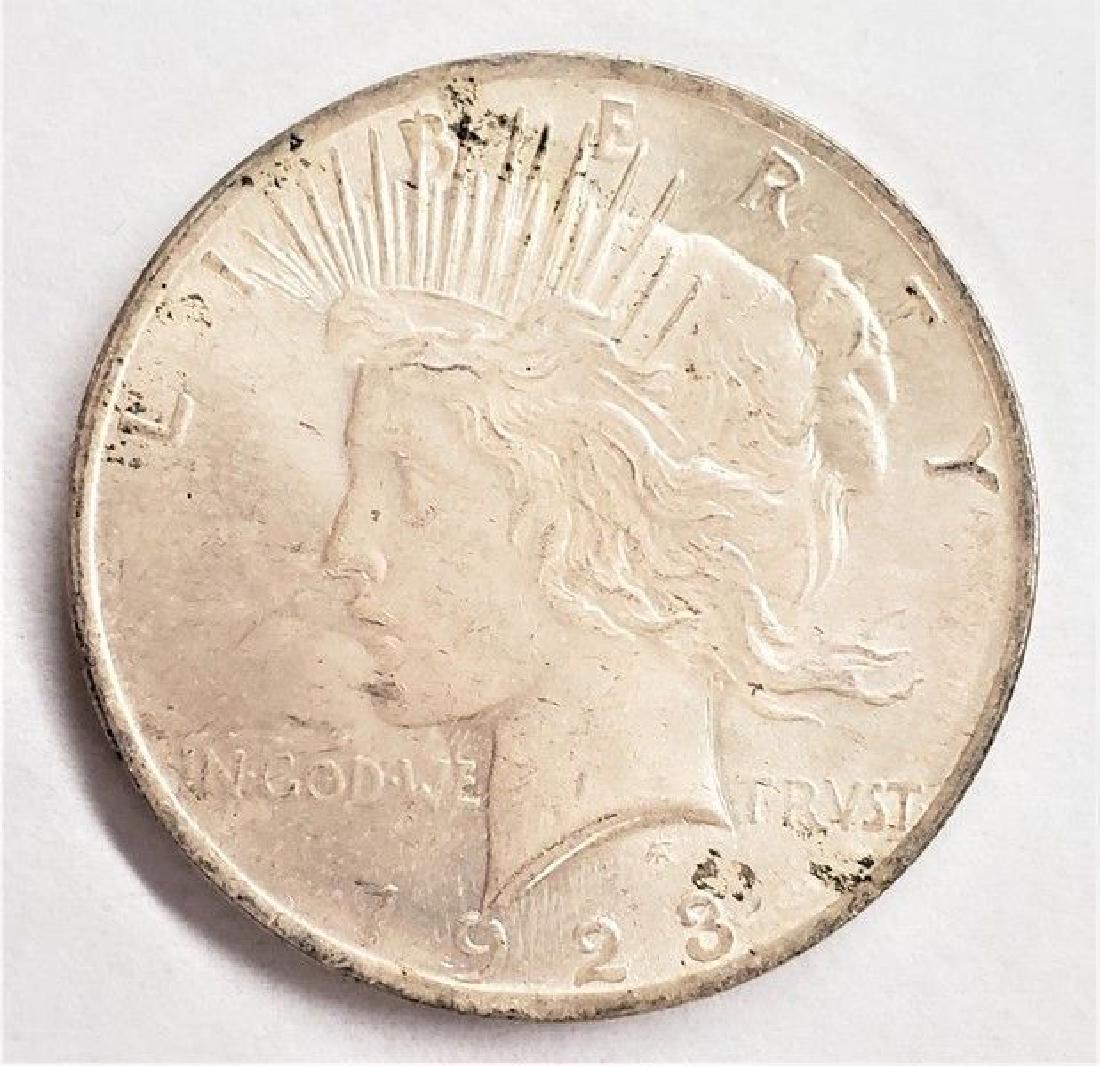 1923-P SILVER PEACE DOLLAR MS63 (1 of 2)