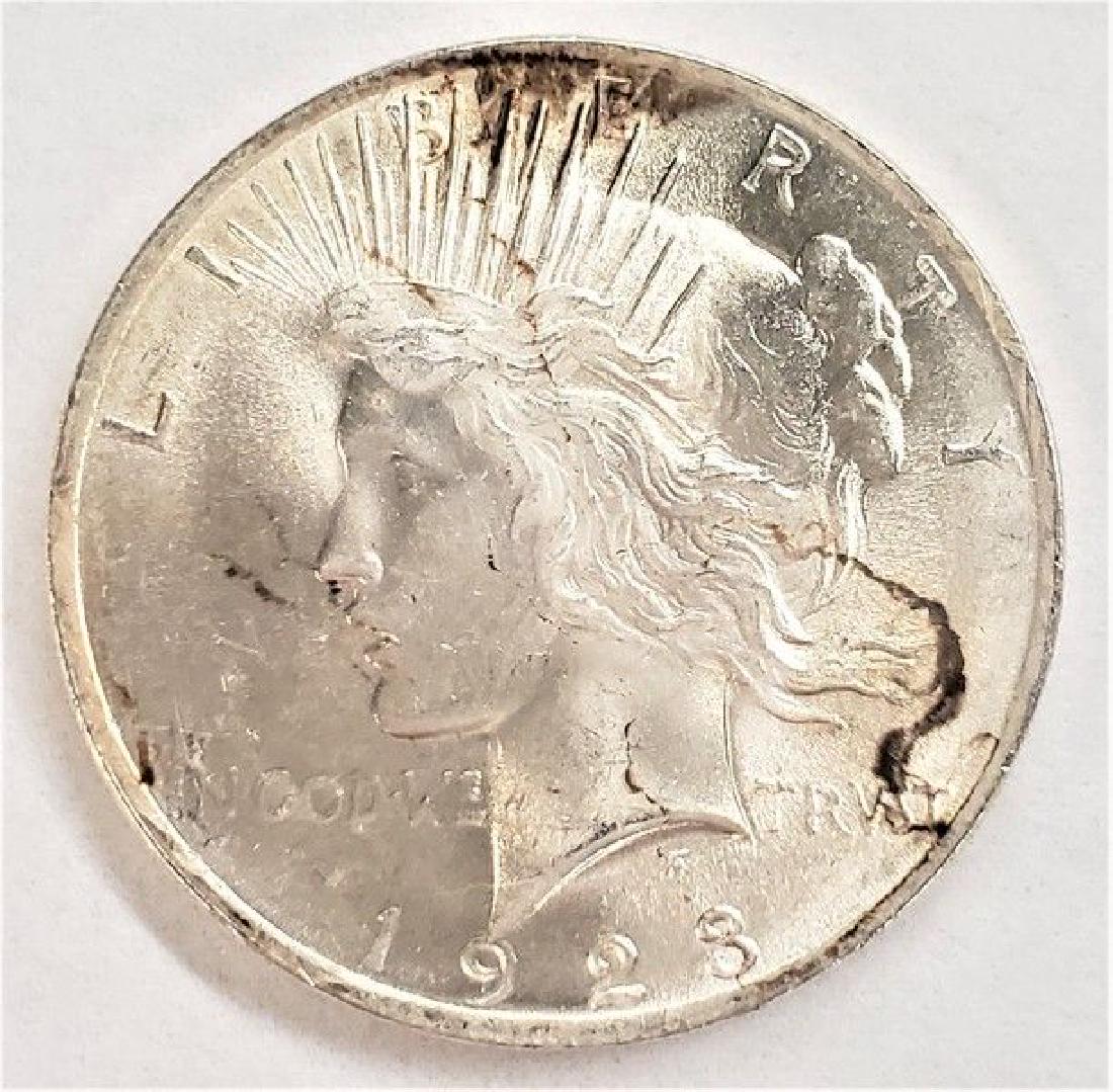 1923-P SILVER PEACE DOLLAR MS63 (1 of 2)