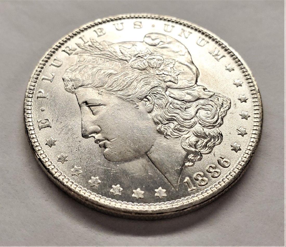 1886 MORGAN SILVER DOLLAR MS64 (1 of 2)