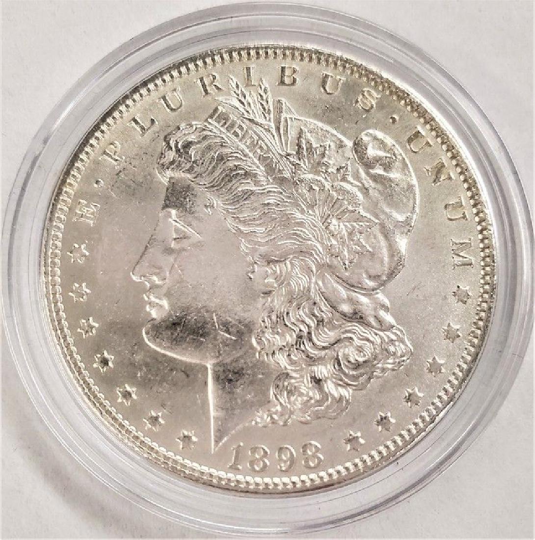 1898 AU MORGAN SILVER DOLLAR (1 of 2)