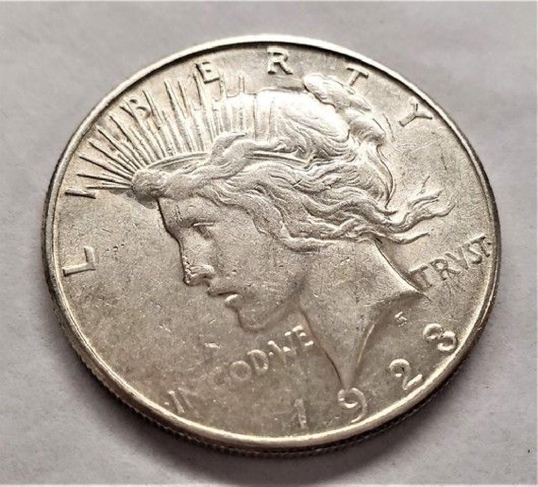 1923-S SAMPLE PEACE DOLLAR ALMOST MINT (1 of 2)