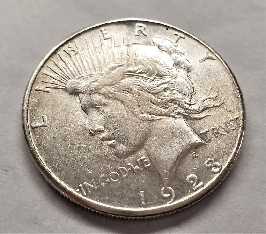 1923-S SAMPLE PEACE DOLLAR ALMOST MINT (1 of 2)