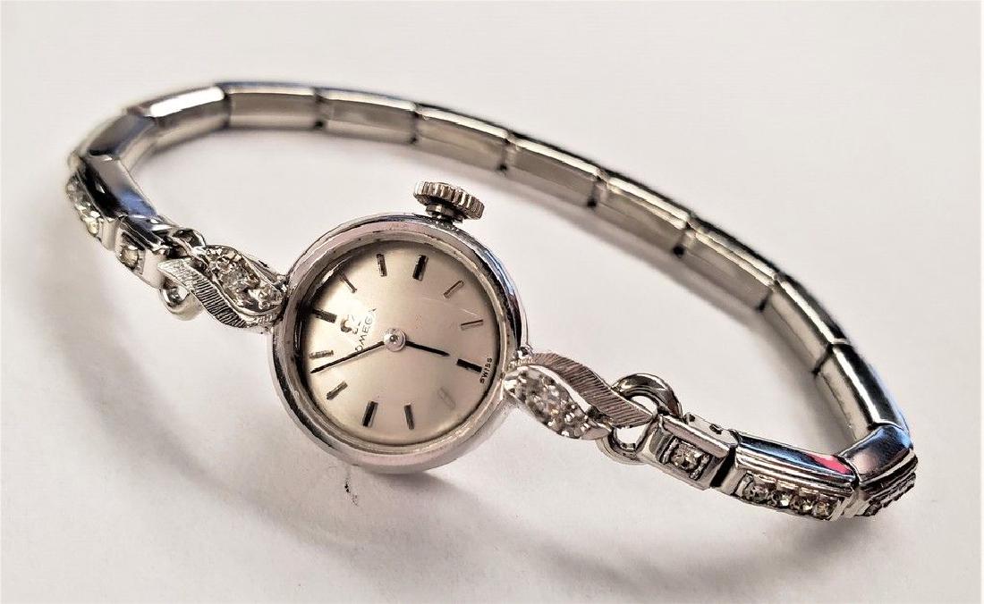 OMEGA SWISS 10K G.F W/ 2 REAL DIAMONDS WATCH (1 of 5)
