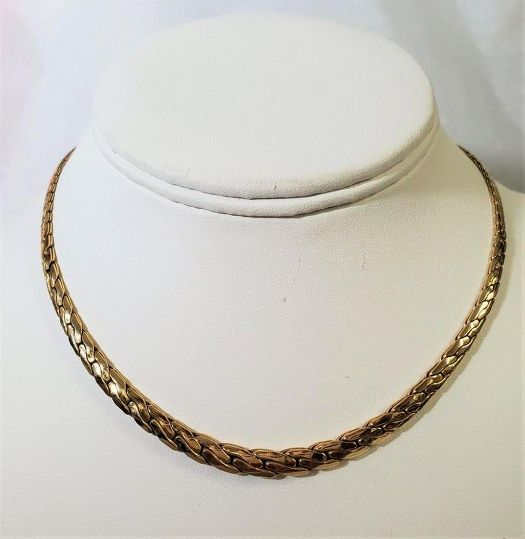 ELEGANT LADIES 14K GOLD CHOKER BEAUTIFUL CHAIN: ELEGANT LADIES 14K GOLD CHOKER BEAUTIFUL CHAIN LENGTH: 14 INCHES WEIGHS: 9.6 GRAMS WITH GOLD AT 1300 PER OUNCE, THE MELT VALUE OF THIS ITEM IF THIS WAS SOLD EXACTLY ONLY AT GOLD WEIGHT MELT VALUE WOUL