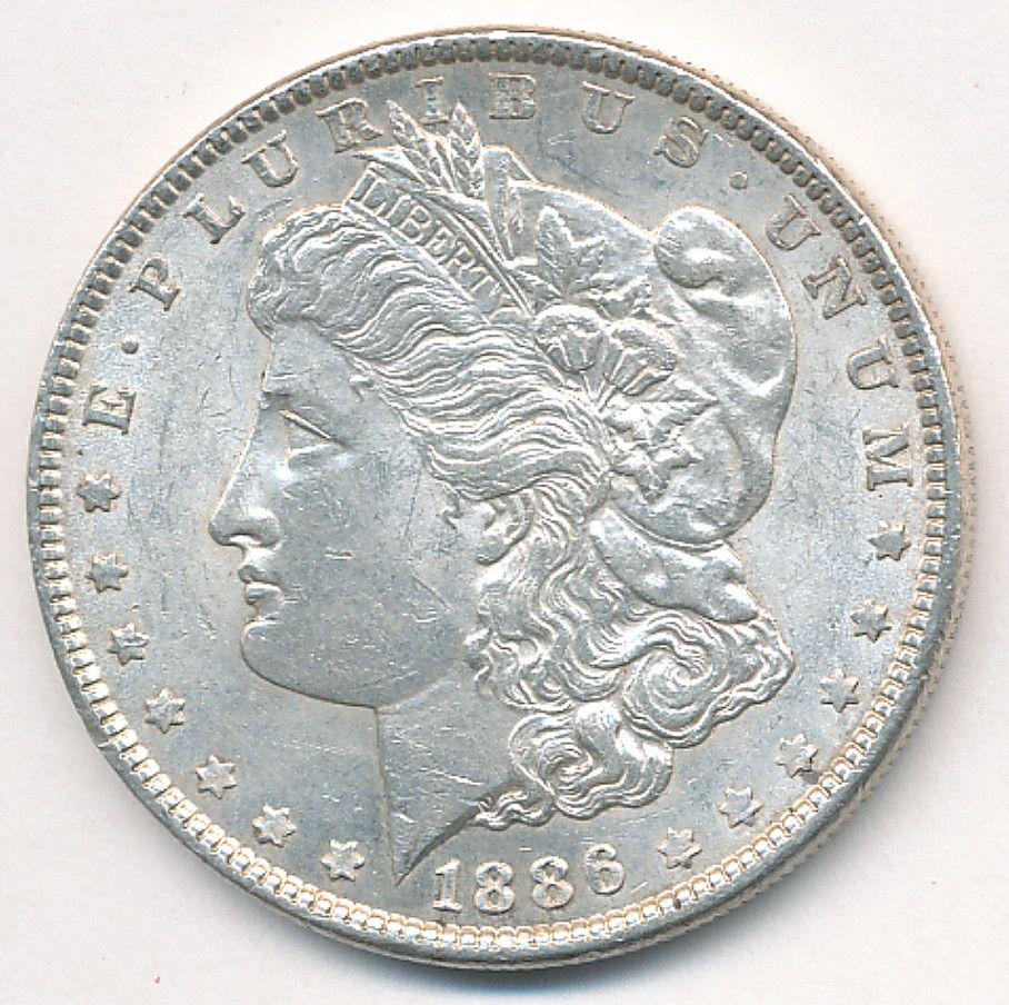 1886 MORGAN SILVER DOLLAR MS 63 (1 of 2)