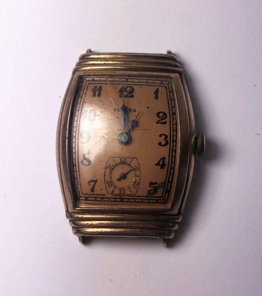 BULOVA WATCH WITH SECOND HAND 16.7 GRAMS: WATCH DOES NOT WORK, BUT IT IS A VERY NICE BULOVA WATCH. NO BAND IS INCLUDED. 16.7 GRAMS WINNER SHALL RECEIVE EXACT ITEM SHOWN HERE