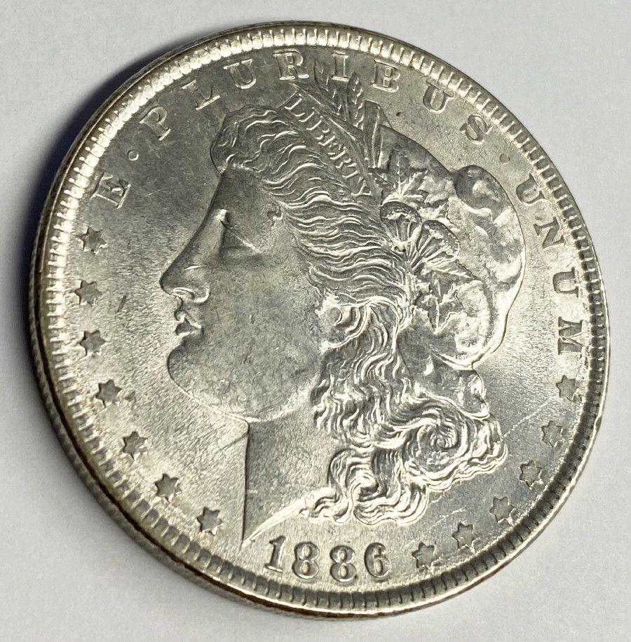 1886 MORGAN SILVER DOLLAR MS63 (1 of 3)