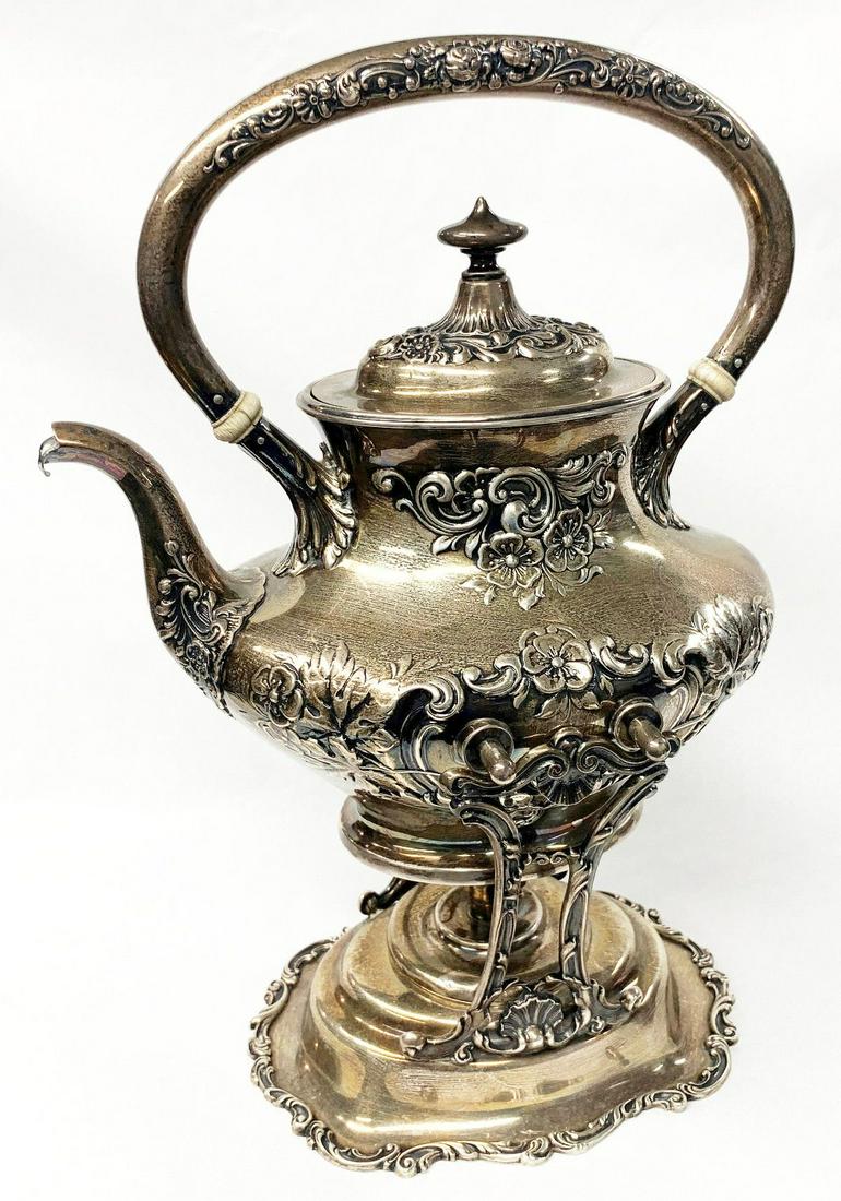 1912 GORHAM STERLING TEA KETTLE AND STAND: BUTTERCUP (STERLING HOLLOWARE) -1912 - HEIGHT 7.5IN WINNER SHALL RECEIVE THE EXACT ITEM SHOWN HERE THE ITEM ENCLOSED ORIGINALLY COMES FROM THE ESTATE OF THIS NOW LEGENDARY OLD MACHINE. IF YOU HAVE ANY