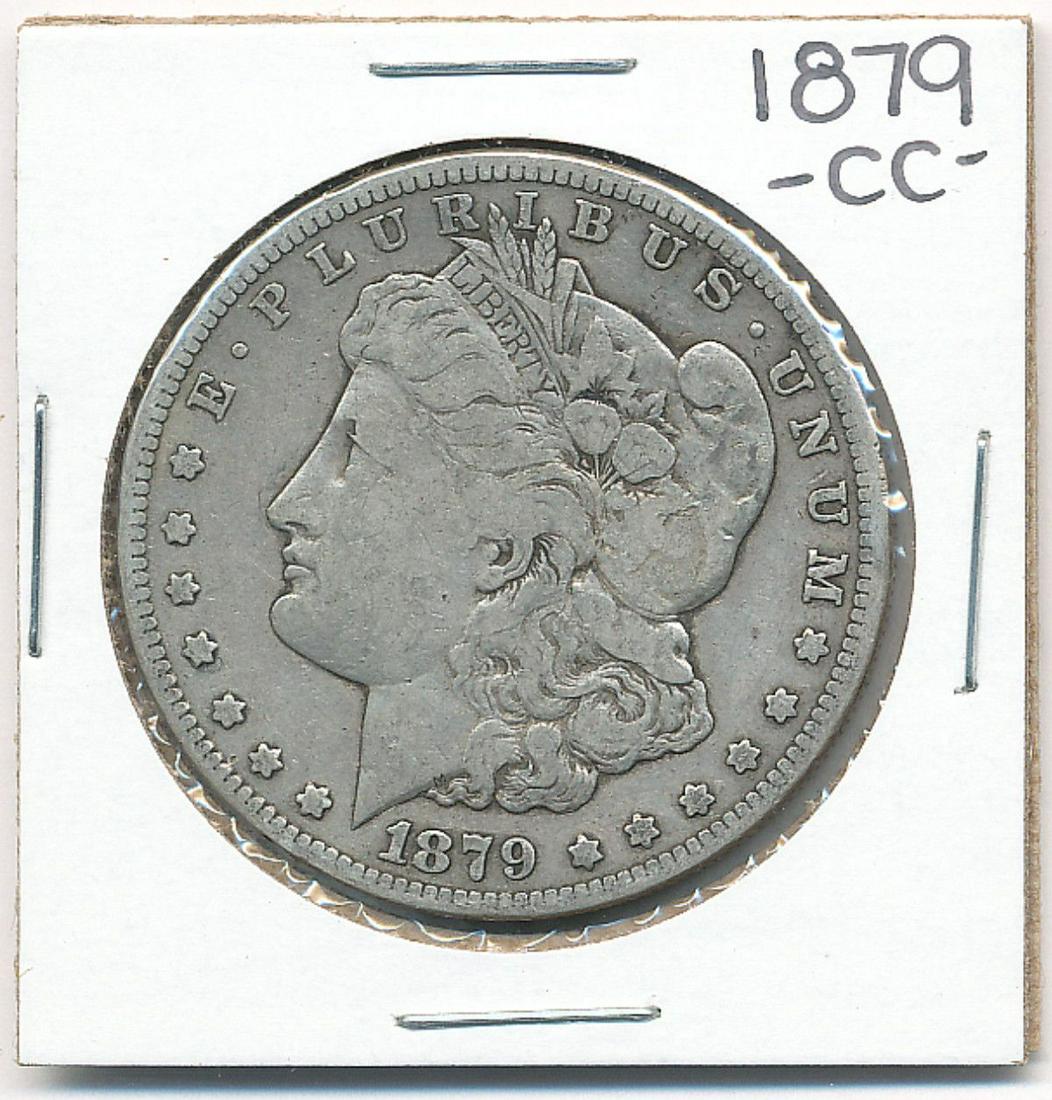 1879-CC FINE MORGAN SILVER DOLLAR: AS THIS IS LAST MINUTE LOT WE HAVE $2 LOWS ON ALL OF IT AND $2,000 HIGHS. ALL OF THESE LOTS ARE WORTH SOMEWHERE IN BETWEEN. ANY QUESTIONS ON THE SPECIFIC VALUES PLEASE FEEL FREE TO CALL OUR OFFICE TOL