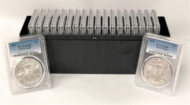 BOX OF (20) MS69 PCGS SILVER EAGLES 2002: BOX OF (20) MS69 PCGS SILVER EAGLES 2002 WINNER OF AUCTION SHALL RECEIVE THE EXACT BOX OF (20) 2002 AMERICAN SILVER EAGLE 1 OZ PCGS MS 69 SHOWN HERE. ALL 20-COINS ARE GRADED BY PCGS, AND ARE IN CONSEC