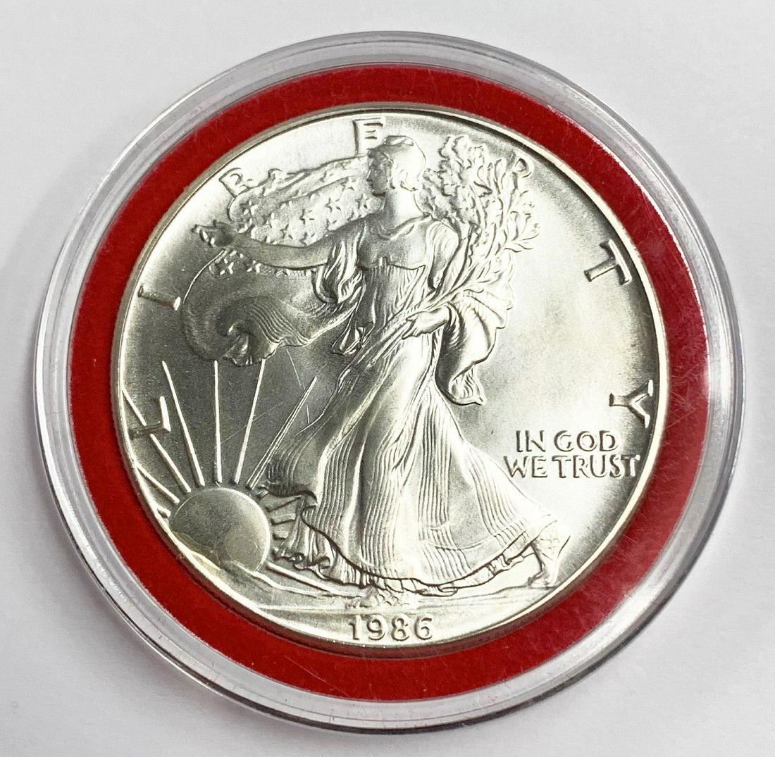 1986 AMERICAN SILVER EAGLE MS69: WINNER SHALL RECEIVE THE EXACT COIN SHOWN HERE