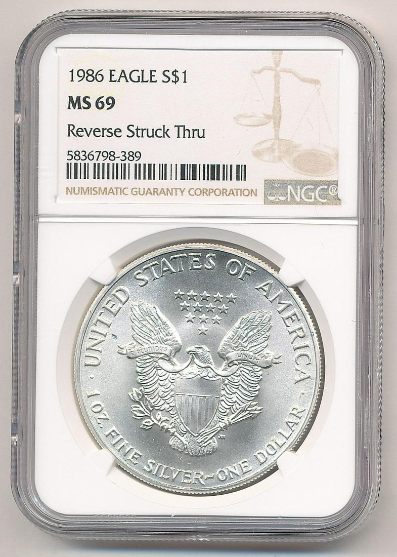 EXTREMLY RARE MINT ERROR 1986 EAGLE NGC MS69: EXTREMLY RARE MINT ERROR 1986 AMERICAN SILVER EAGLE NGC MS69 ONE OF OUR CONSIGNORS SENT IN AN ORIGINAL 1986 MONSTER BOX CONTAINING 25 ROLLS THAT WERE ORIGINAL LIKE THIS ONE. THE EXAMPLE HERE IS HOW TH