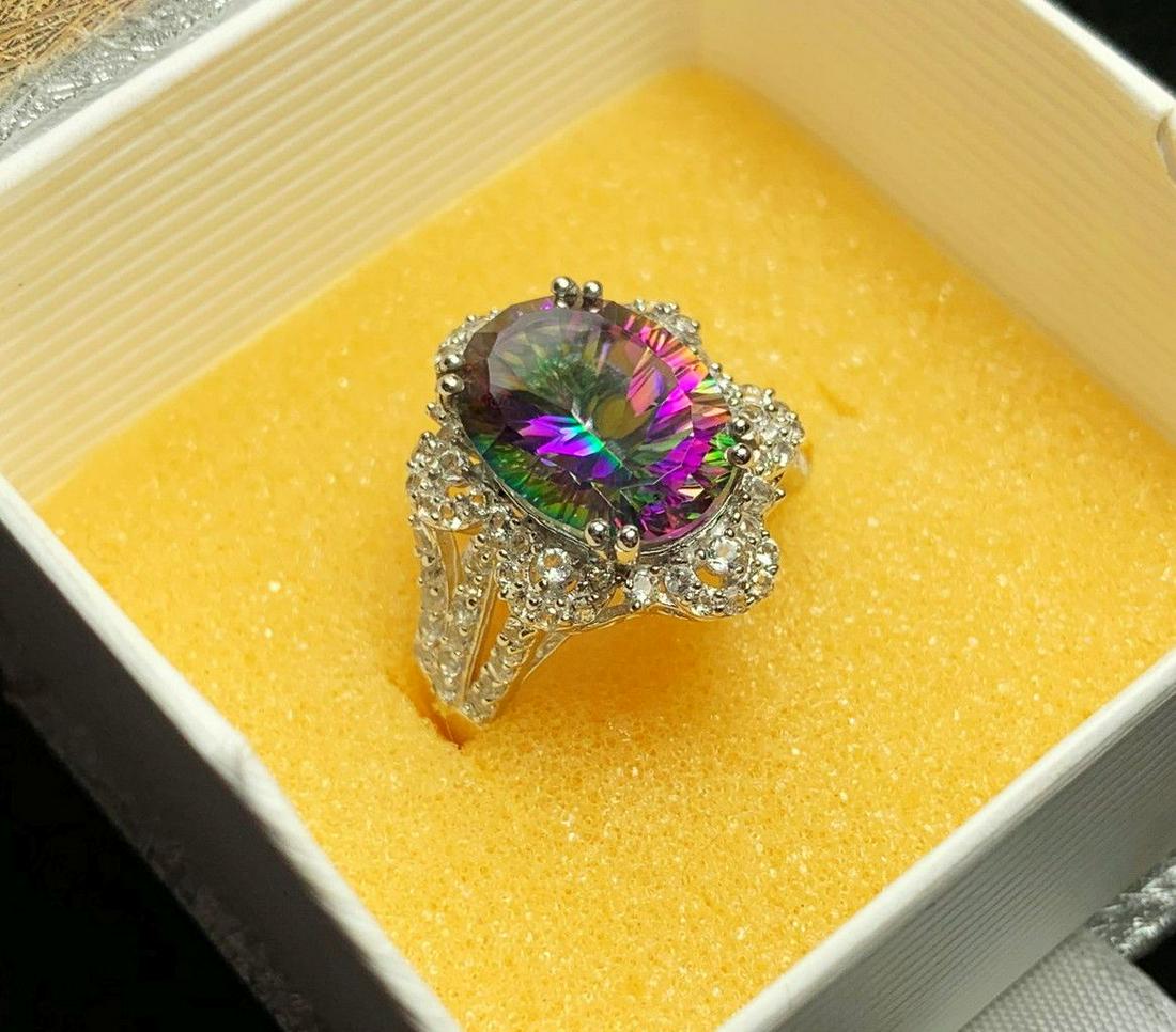 QUARTZ & TOPAZ TITANIUM/SILVER RING SIZE=7.25: 6.06 OVAL MYSTIC QUARTZ AND WHITE TOPAZ TITANIUM/SILVER RING SIZE= 7.25 WINNER SHALL RECEIVE THE EXACT ITEM SHOWN HERE
