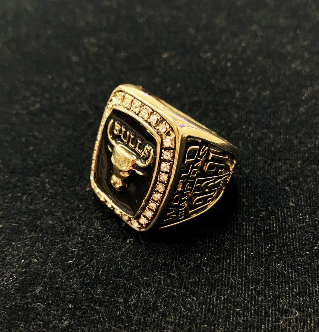 MICHAEL JORDAN WORLD CHAMP 1991 BULLS RING: MICHAEL JORDAN WORLD CHAMP 1991 CHICAGO BULLS RING -RING SIZE 11 WINNER SHALL RECEIVE THE EXACT ITEM SHOWN HERE