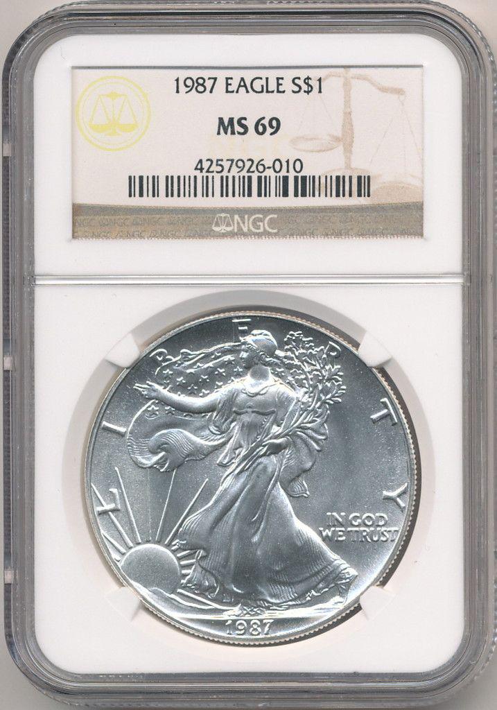 1987 AMERICAN SILVER EAGLE NGC MS69: THIS EARLY RARE DATE, ESPECIALLY IN DEMAND THESE DAYS LISTS ON THE NGC PRICE GUIDE AT $60 IN MS69 AND $1,025 IN MS70 WINNER SHALL RECEIVE ONE COIN PRECISELY RESEMBLING THE COIN SHOWN HERE