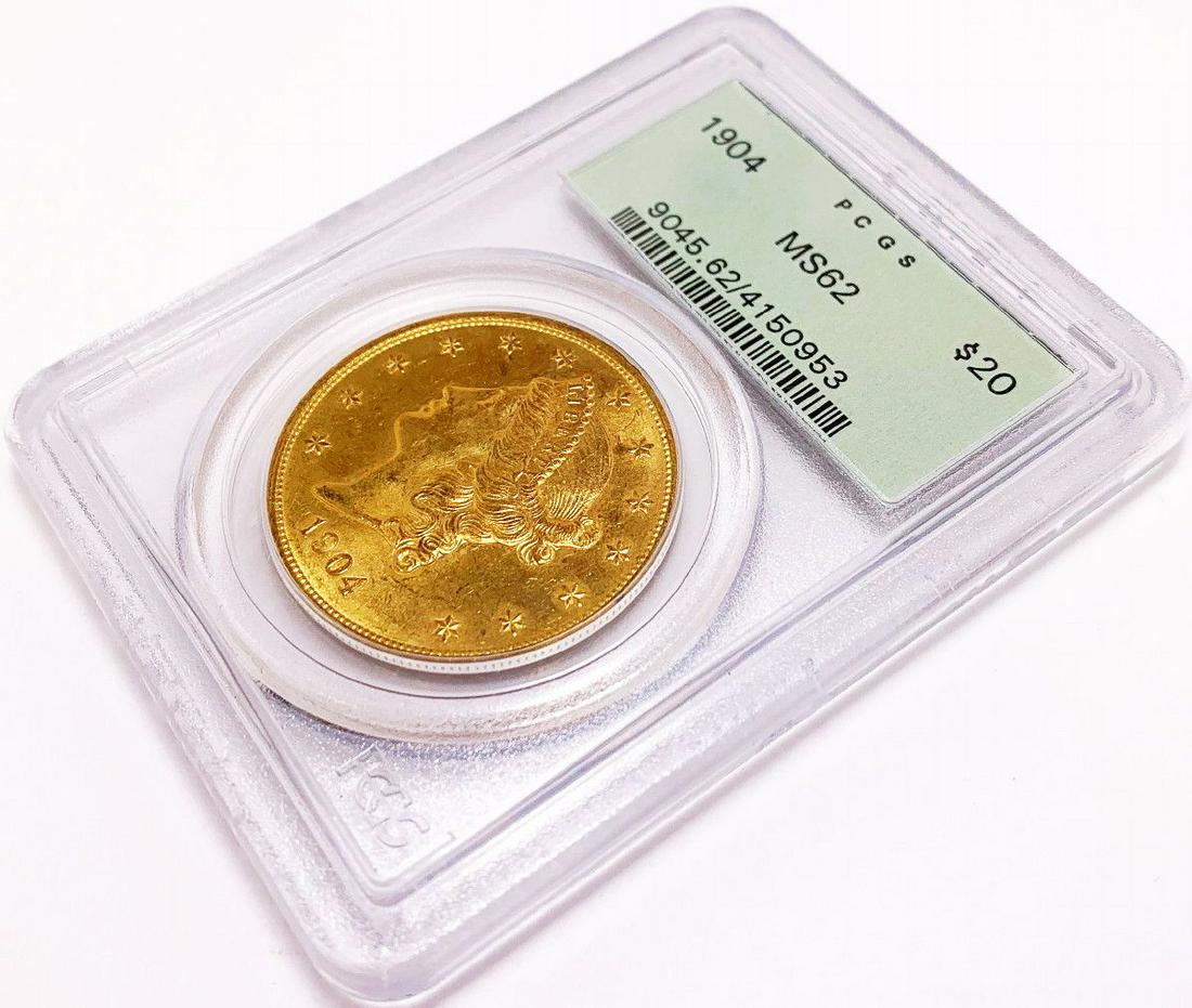 1904 $20 GOLD LIBERTY MS62 OGH PCGS LOOKS PL: 1904 $20 GOLD LIBERTY MS62 OGH PCGS LOOKS PL IT IS WIDELY BELIEVED THAT BACK IN THE 1990's BOTH PCG AND NGC GRADED COINS MORE STRICT. IF THE SAME COIN AS YOU SEE HERE WAS GRADED TODAY, OFTEN TIMES IT