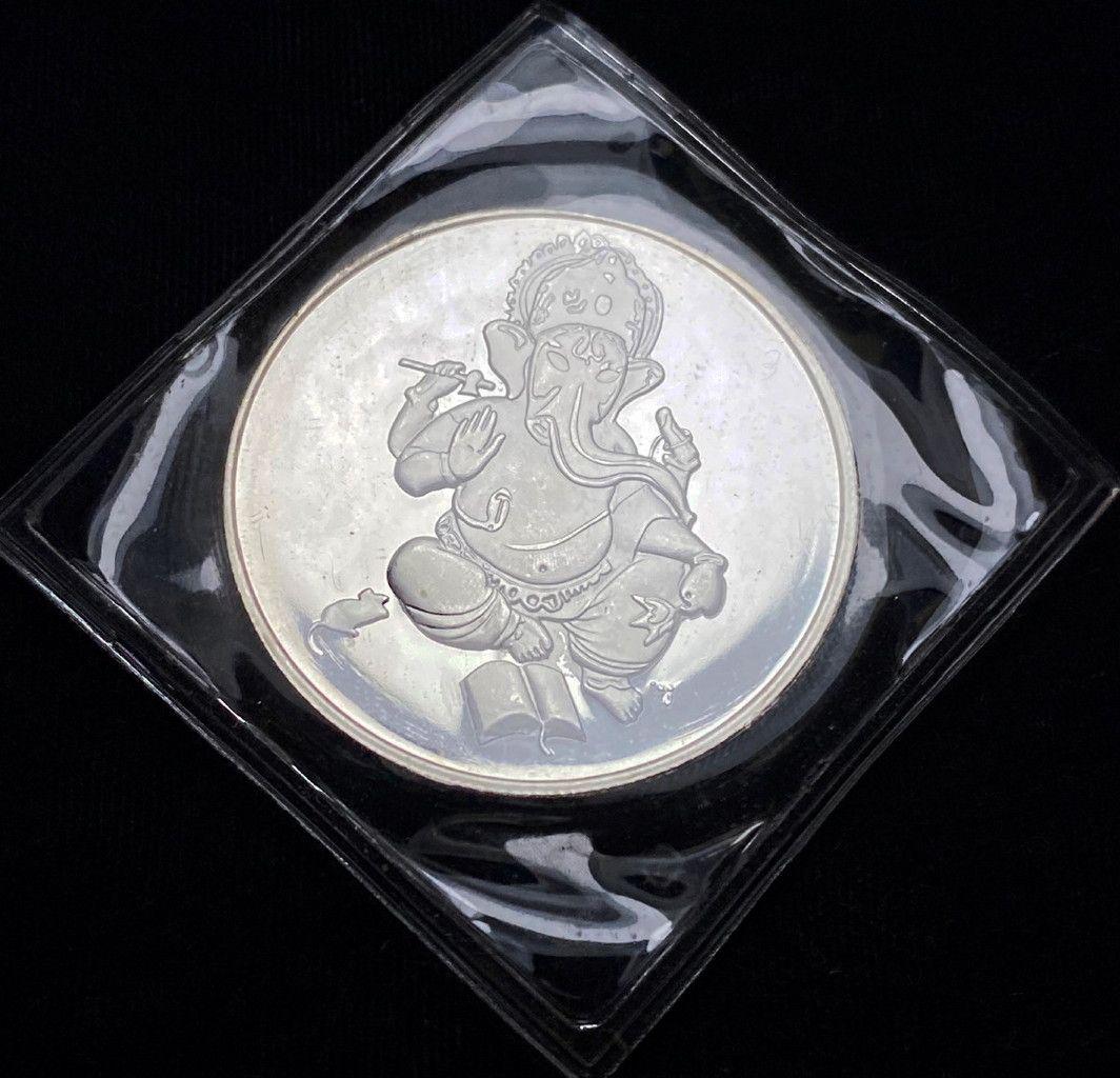 2012 GANESHA BUDDHIST 1 TROY OZ. .999 FINE SILVER ROUND: WINNER SHALL RECEIVE THE EXACT ROUND SHOWN HERE