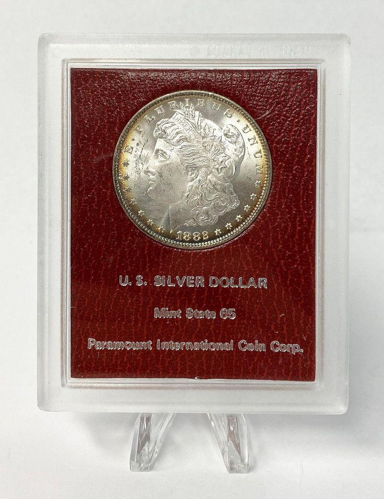 1882-P REDFIELD MORGAN SILVER DOLLAR MS65: SOME OF YOU KNOW THE STORY OF LAVERE REDFIELD. HE WAS A FAIRLY WEALTHY MAN WHO DID NOT TRUST BANKS SO HE BOUGHT BAGS OF SILVER DOLLARS WHICH HE KEPT HIDDEN IN HIS HOME. HE WAS ROBBED SEVERAL TIMES, BU