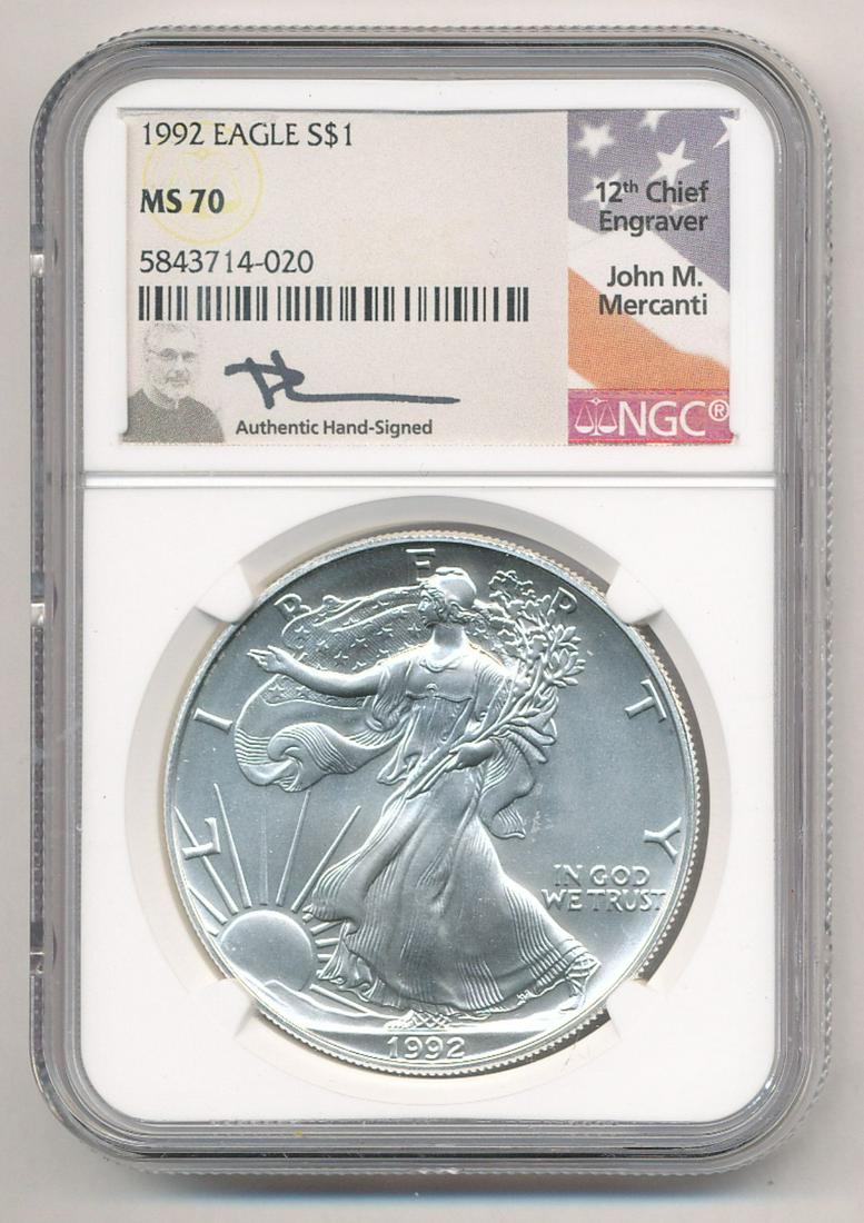1992 SILVER EAGLE NGC MS 70 "JOHN M. MERCANTI LABEL": JOHN M. MERCANTI SIGNATURE LABEL COINS HAVE PROVEN TO BE IN HIGH DEMAND. JOHN M. MERCANTI, THE 12TH CHIEF ENGRAVER OF THE UNITED STATES MINT, IS THE MOST FAMOUS U.S. COIN ENGRAVER OF THE MODERN ERA. M