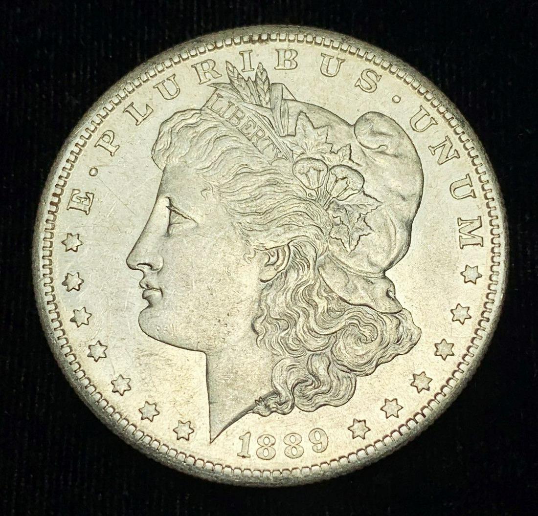 1889-S NICE AU MORGAN SILVER DOLLAR (1 of 2)