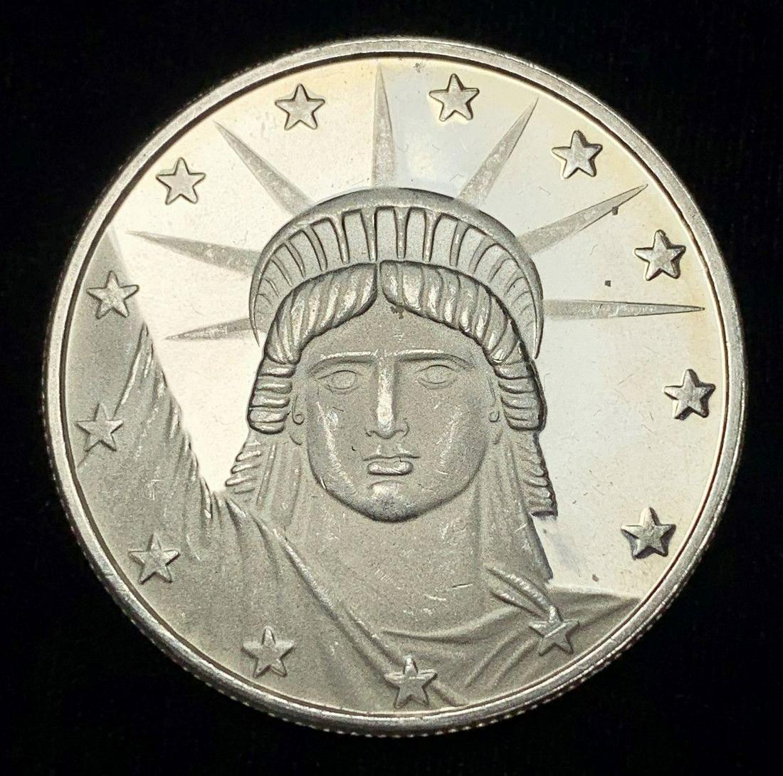 STATUE OF LIBERTY .999 FINE SILVER ROUND: WINNER SHALL RECEIVE THE EXACT COIN SHOWN HERE