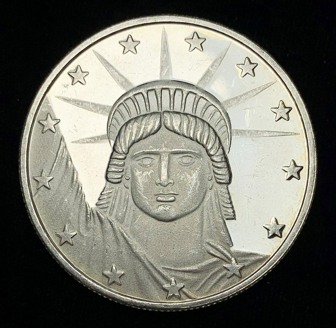 STATUE OF LIBERTY .999 FINE SILVER ROUND: WINNER SHALL RECEIVE THE EXACT COIN SHOWN HERE