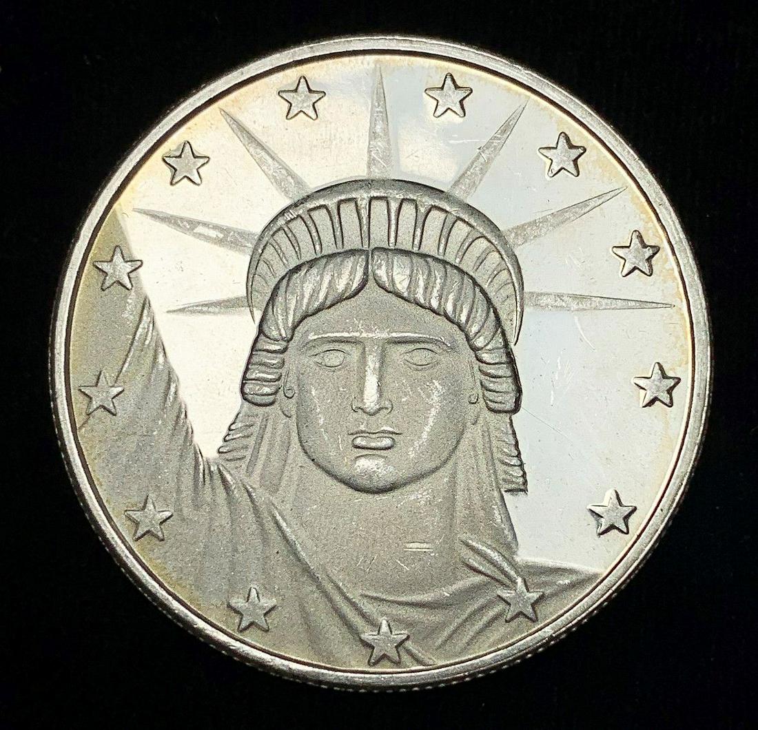 STATUE OF LIBERTY .999 FINE SILVER ROUND: WINNER SHALL RECEIVE THE EXACT COIN SHOWN HERE
