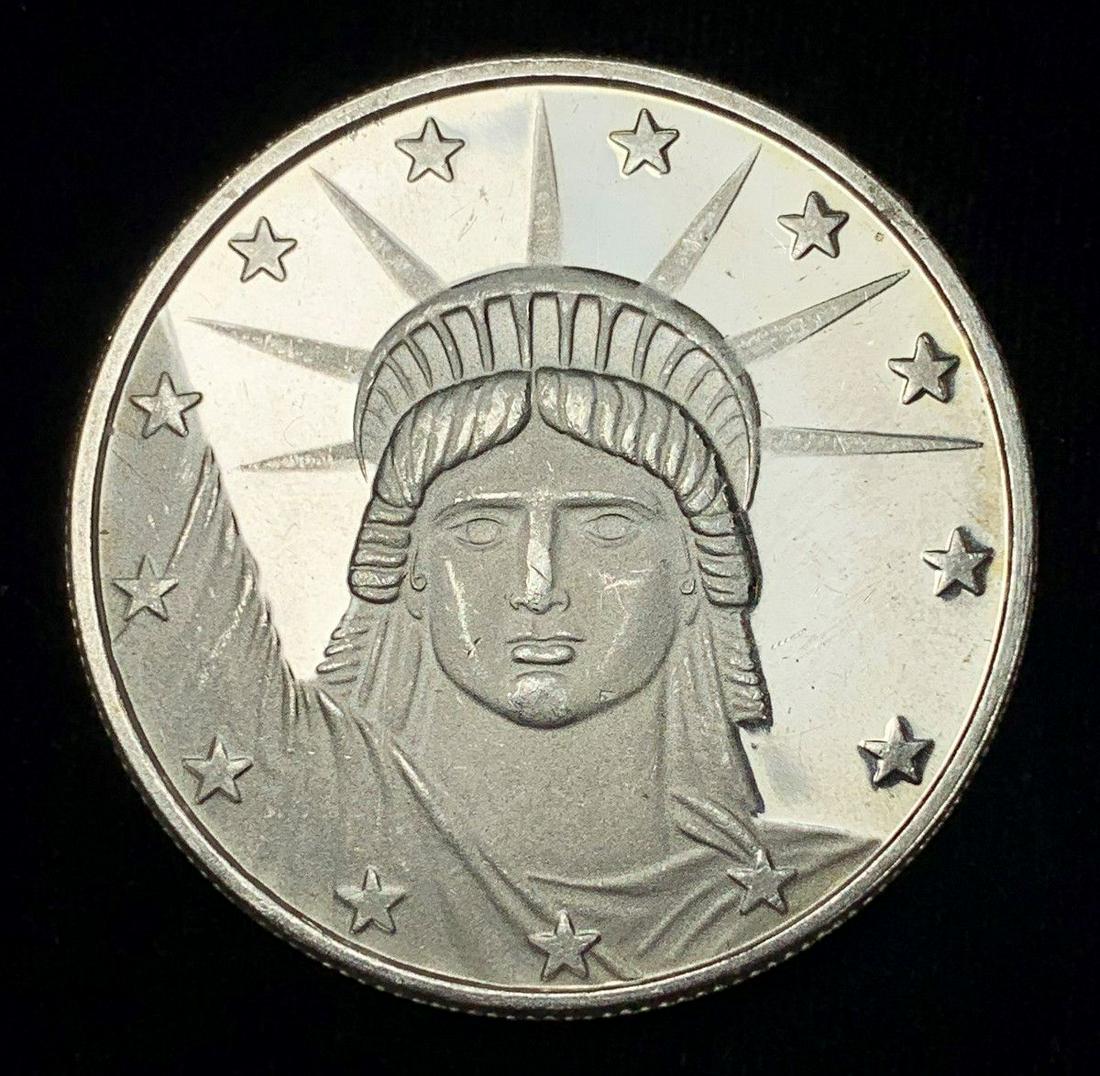 STATUE OF LIBERTY .999 FINE SILVER ROUND: WINNER SHALL RECEIVE THE EXACT COIN SHOWN HERE