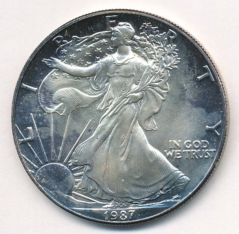 1987 AMERICAN SILVER EAGLE MS69 NICE COLOR (1 of 2)