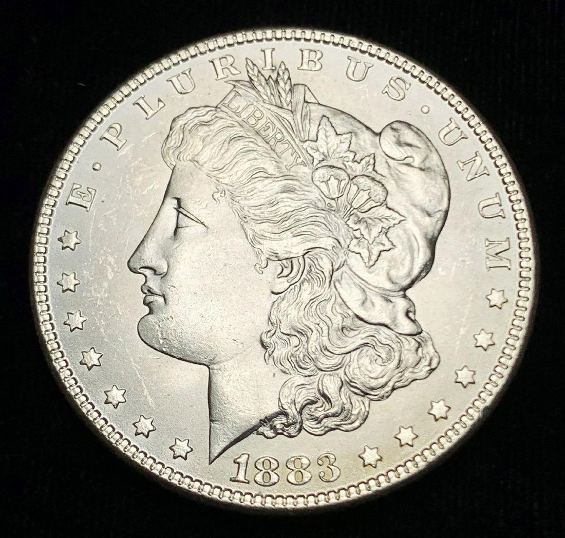 1883 Morgan Silver Dollar MS64/65: Winner Shall Receive The Exact Coin Shown Here