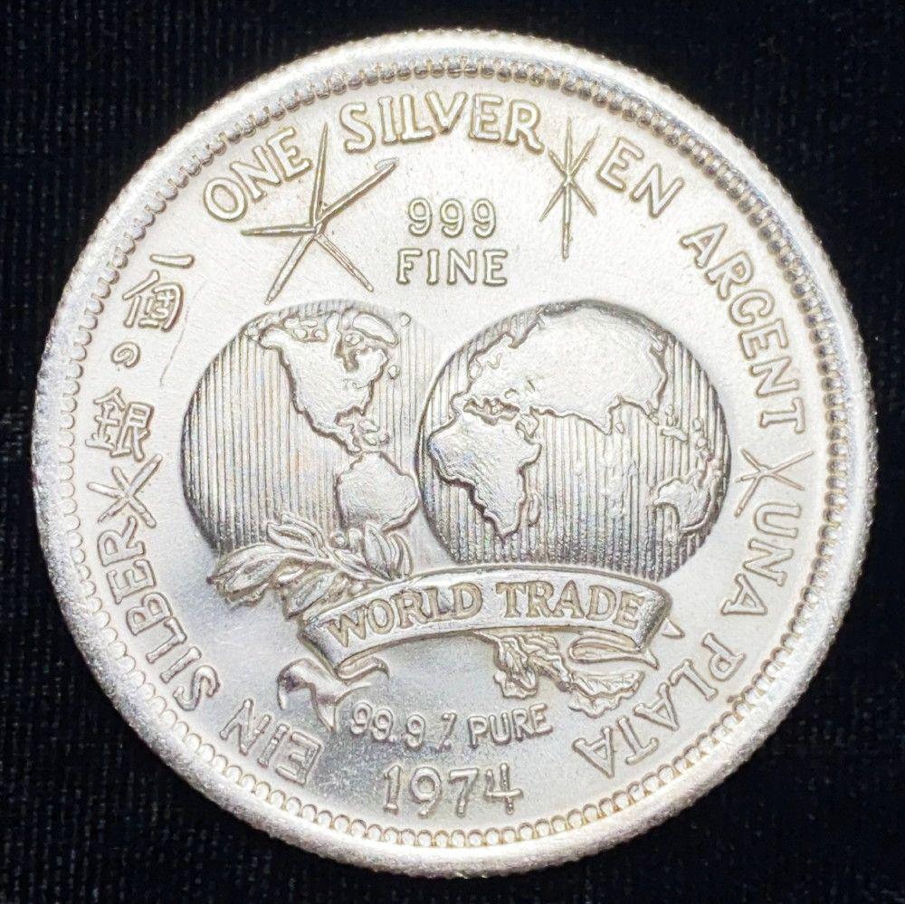 1974 The International World Trade Unit .999 Slver 1 Oz: 1974 The International Universal World Trade Unit .999 Silver 1 Ounce. Winner shall receive a coin precisely resembling the coin shown here.